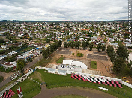 Aerial view of a sector of grandstands in the Raúl Goyenola stadium and part of the city - Tacuarembo - URUGUAY. Photo #66599