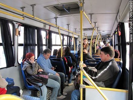 Passengers of a bus - Department of Montevideo - URUGUAY. Photo #45890