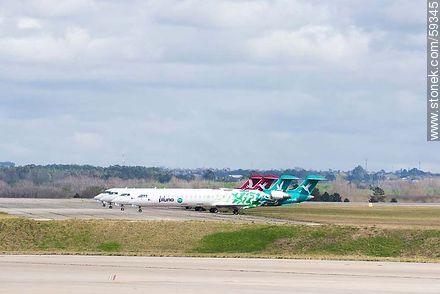 Pluna Bombardier airplanes (sept 2013) - Department of Canelones - URUGUAY. Photo #59345