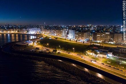 Aerial night view of the ramblas Republica del Peru and Charles de Gaulle - Department of Montevideo - URUGUAY. Photo #65583