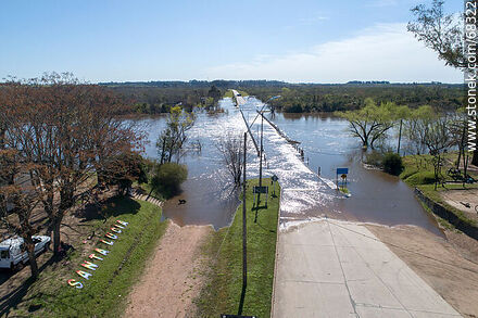 Aerial view of the Santa Lucia River overflowing covering the old Route 11 - Department of Canelones - URUGUAY. Photo #68322