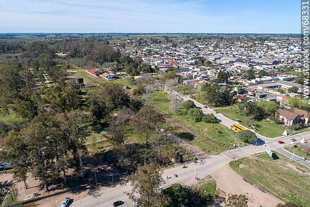 Aerial view of old Route 11, the railroad track and the train station - Department of Canelones - URUGUAY. Photo #68331