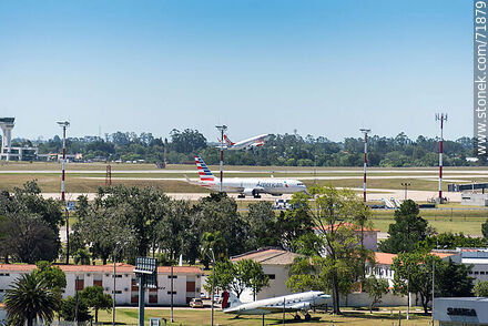 Air Base No. 1, former DC-3 / C-47 on display and Gol plane taking off - Department of Canelones - URUGUAY. Photo #71879