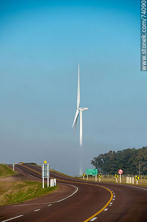 Wind turbines emerging from the morning fog near the Pampa station on Route 5. - Tacuarembo - URUGUAY. Photo #74090