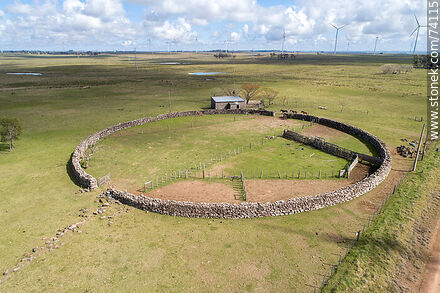 Aerial view of a large old stone corral. Archeological reserve site - Tacuarembo - URUGUAY. Photo #74115