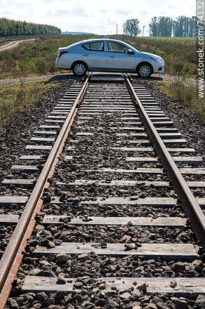 Automobile on railroad tracks -  - MORE IMAGES. Photo #74132