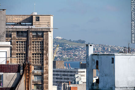 Part of the ANEP building, Min. Industria in Colonia and Libertador Avenue, Central Bank and the Cerro del Cerro fortress. - Department of Montevideo - URUGUAY. Photo #75015