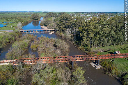 Aerial view of the railroad and road bridges over the Santa Lucía river, departmental boundary between Canelones (San Ramón) and Florida. - Department of Canelones - URUGUAY. Photo #75293