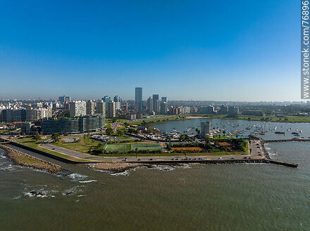 Aerial photo of the Yatch Club of Montevideo in Puerto del Buceo and its towers in the background - Department of Montevideo - URUGUAY. Photo #76896