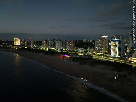Aerial view of the sea, the promenade and the buildings of Playa Mansa at sunset - Punta del Este and its near resorts - URUGUAY. Photo #77093