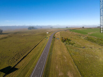 Vista aérea de la ruta 8 al sur con bruma matinal -  - URUGUAY. Foto No. 78354
