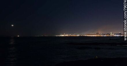 The new moon is about to set under the sea - Department of Montevideo - URUGUAY. Photo #79074