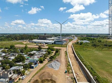 Aerial view of the Central Railroad construction site in Las Piedras in October 2022. Windmill powering the construction site - Department of Canelones - URUGUAY. Photo #80146