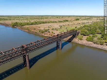 Aerial view of the old railroad bridge over the Arapey Grande River - Department of Salto - URUGUAY. Photo #81149