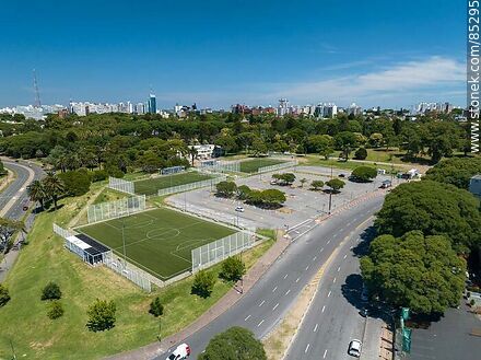 Aerial view in front of the America grandstand of the Centenario Stadium. Parking lot and fenced courts - Department of Montevideo - URUGUAY. Photo #85295