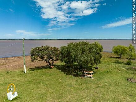 Aerial view of Belén on the banks of the Uruguay River - Department of Salto - URUGUAY. Photo #85458