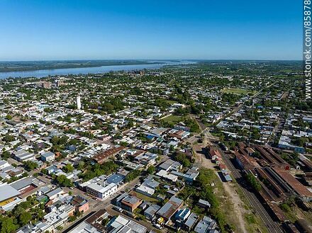 Aerial view of the Paysandú train station and its railroad tracks through the city. - Department of Paysandú - URUGUAY. Photo #85878