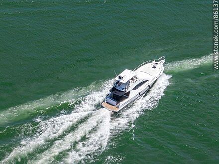 Aerial view of a boat at sea - Punta del Este and its near resorts - URUGUAY. Photo #86137